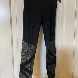XS Victoria’s Secret leggings with mesh cut outs.